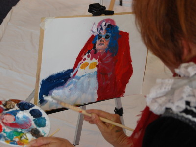 Dandy Chrissy Sabberton being painted by Edwina Blush.