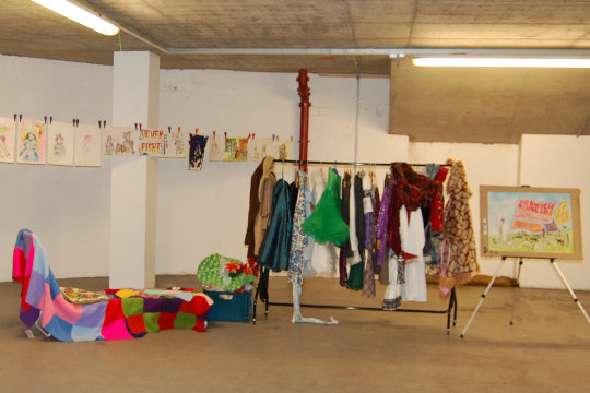 We set up our popular 'Dress, Paint, Pose like a Dandy' workshop in the exhibition space. On the left is our modelling chaise loungue loaded with warm woollen blankets and on the right is a selection from our costume store of expressive clothes for people to dress up in. On the line behind the costume rail are a selection of paintings created at our previous Suffragist workshop event held at Castle Mall.