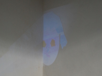 A cartoon projected on a wall inside Oulton Chapel.