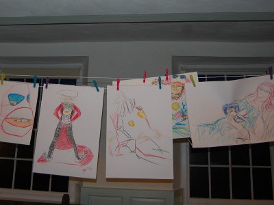 Drawings made at the event hanging from a washing line.